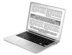 mac laptop with lines of text on screen