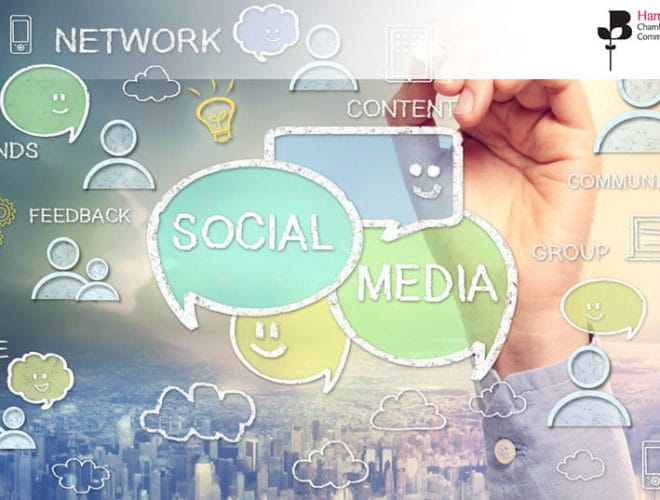 Social Media in a speech bubble with a hand in the background - join this workshop on social media for beginners on 11th March 2020