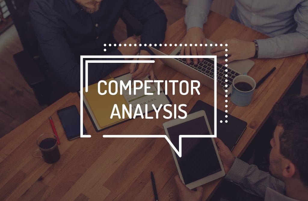 A speech bubble with the words "competitor analysis" inside it