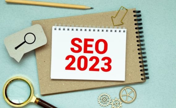A notepad displaying the words SEO 2023