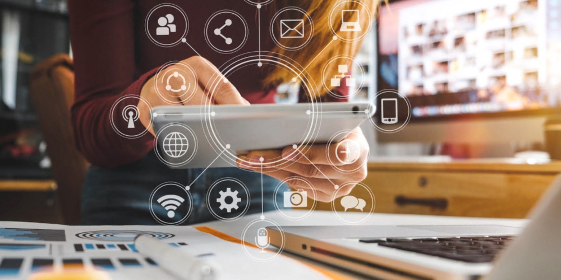 A small business owner carrying out digital marketing on a tablet