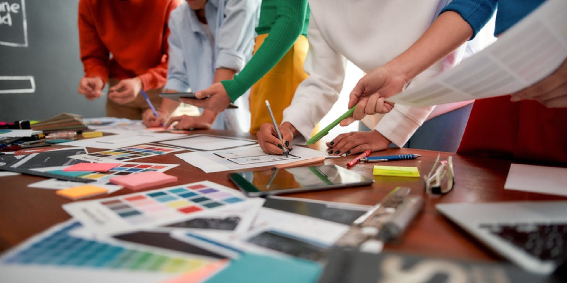 A team of creatives designing a great logo
