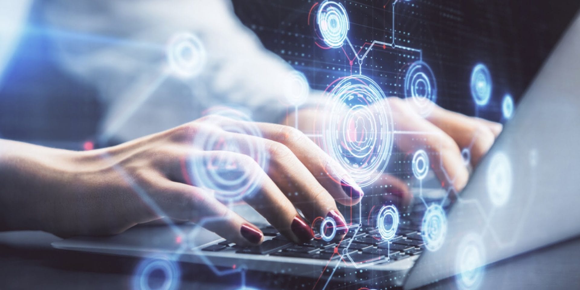 a stylised image of hands using a laptop symbolising copywriting with AI