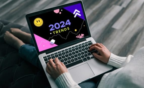 A laptop displaying the words '2024 trends.'