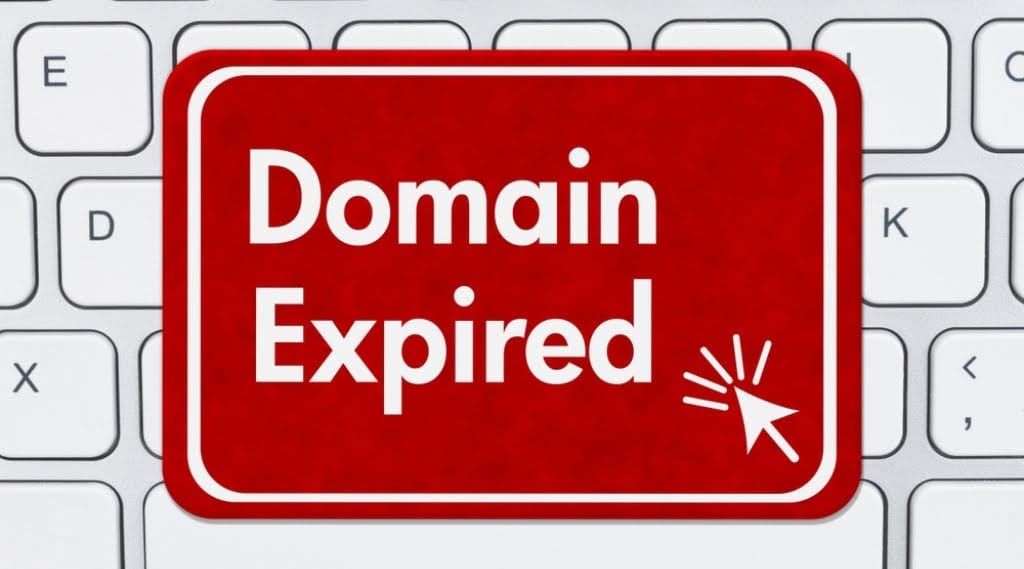 A red label over a keyboard reads 'domain expired'