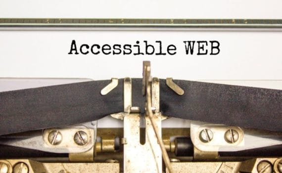 A typewriter types the words 'Accessible WEB' on a blank sheet of paper