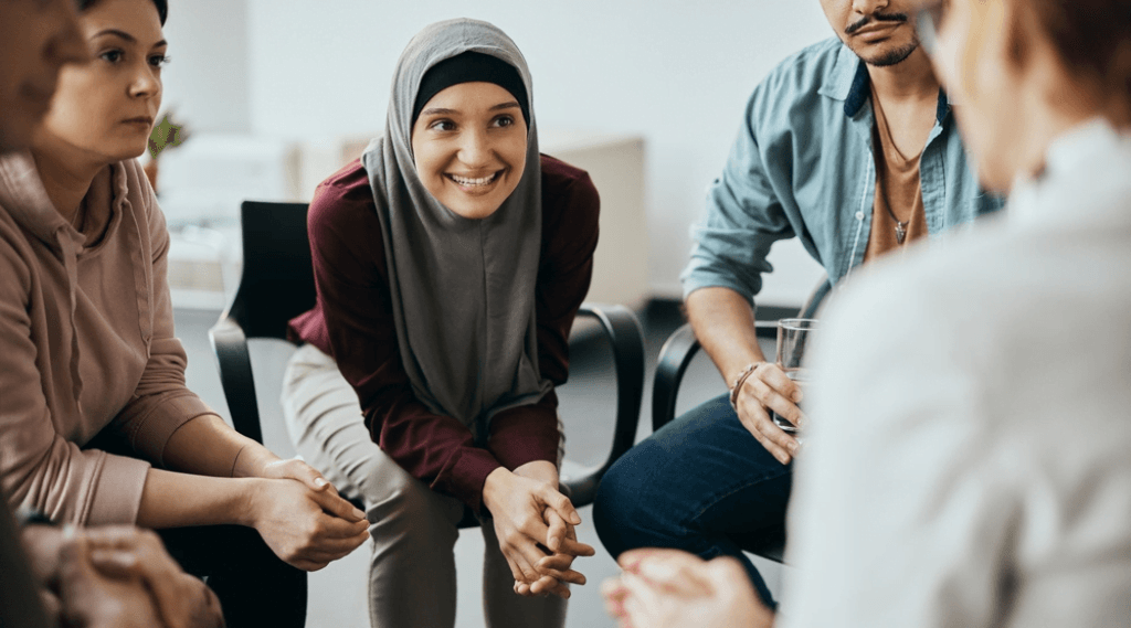 A group of people provide feedback to a brand expert