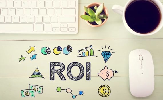 a stylised image of ROI - a mouse, coffee, and keyboard with 'ROI' written on a table with some cartoons