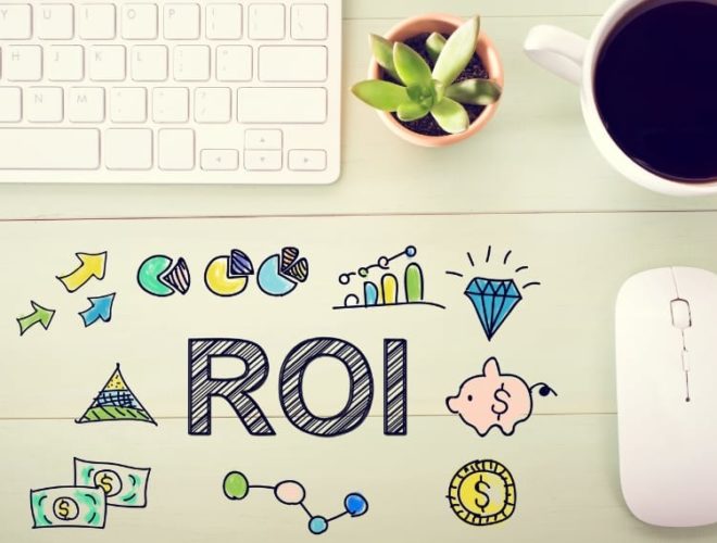 a stylised image of ROI - a mouse, coffee, and keyboard with 'ROI' written on a table with some cartoons