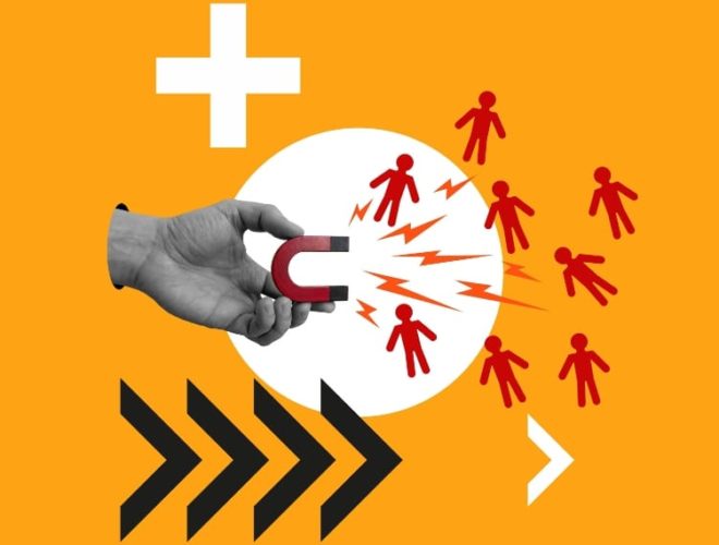 a stylised image of a hand holding a magnet attracting red figures symbolising lead generation