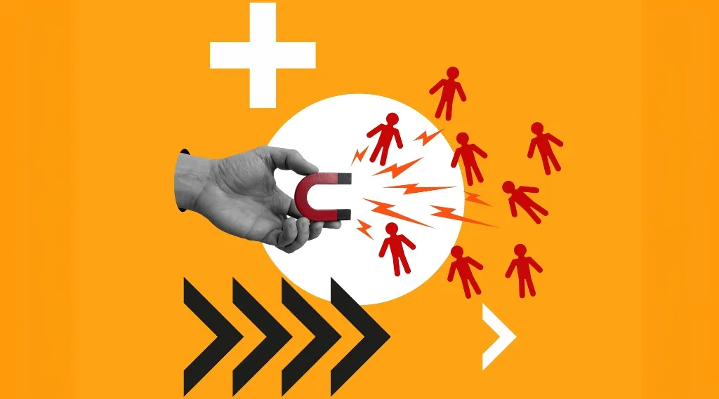 a stylised image of a hand holding a magnet attracting red figures symbolising lead generation