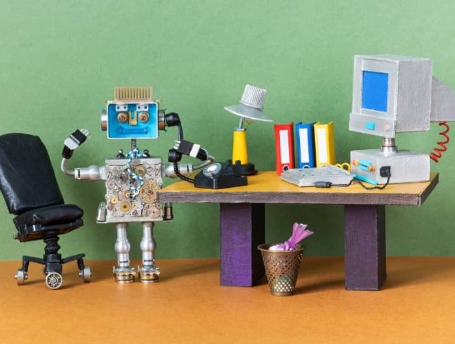 Small robot made from electronic parts with the word “ERROR” on its screen, representing AI for digital marketing issues.