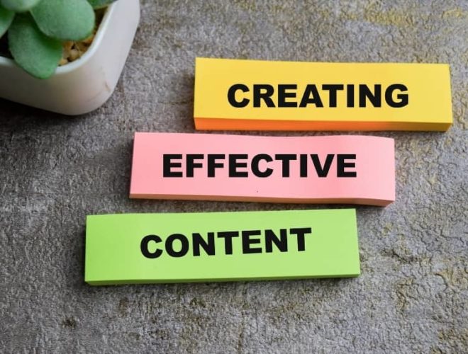 Sticky notes on desk showing the words creating effective content