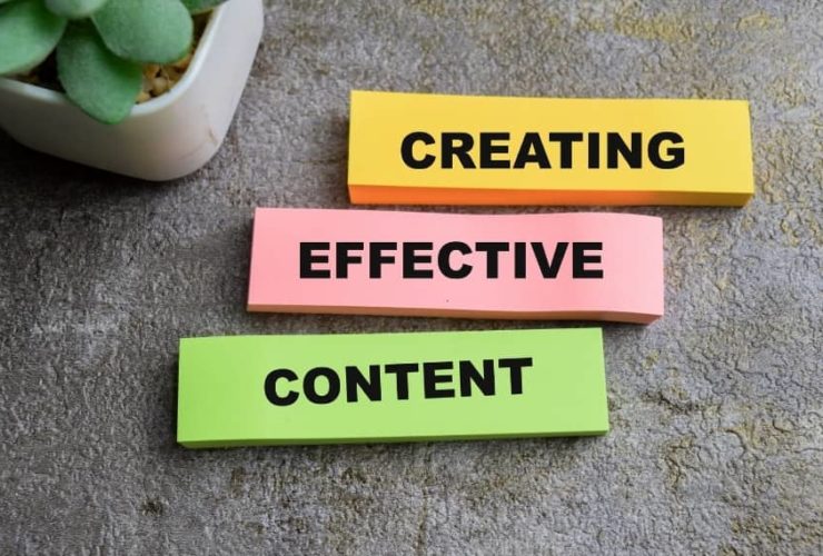 Sticky notes on desk showing the words creating effective content