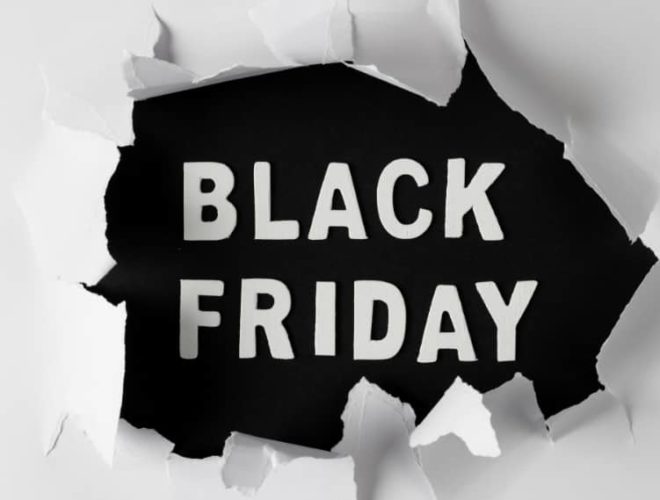 Bold Black Friday PPC promotion design with ripped paper effect background.