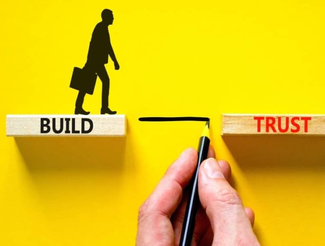 Illustration of building trust across a gap, representing customer relations, stronger brand awareness and long-term ROI growth.