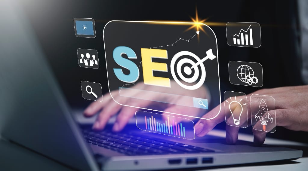 Future of SEO: Hands typing on a laptop with floating digital icons representing SEO, growth graphs, and online tools.