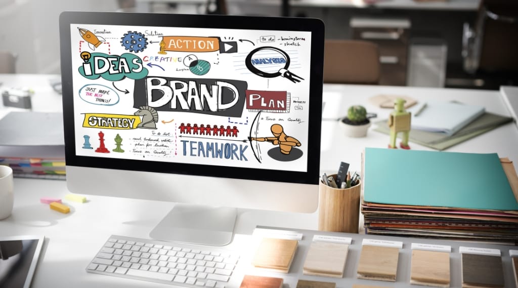 A creative workspace showing brand planning visuals that highlight the balance of brand vs. performance marketing used by marketing agencies in Berkshire.