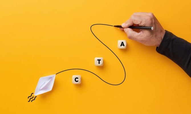 call to action mistakes, a hand drawing a winding line from a paper boat towards wooden blocks spelling CTA on a yellow background