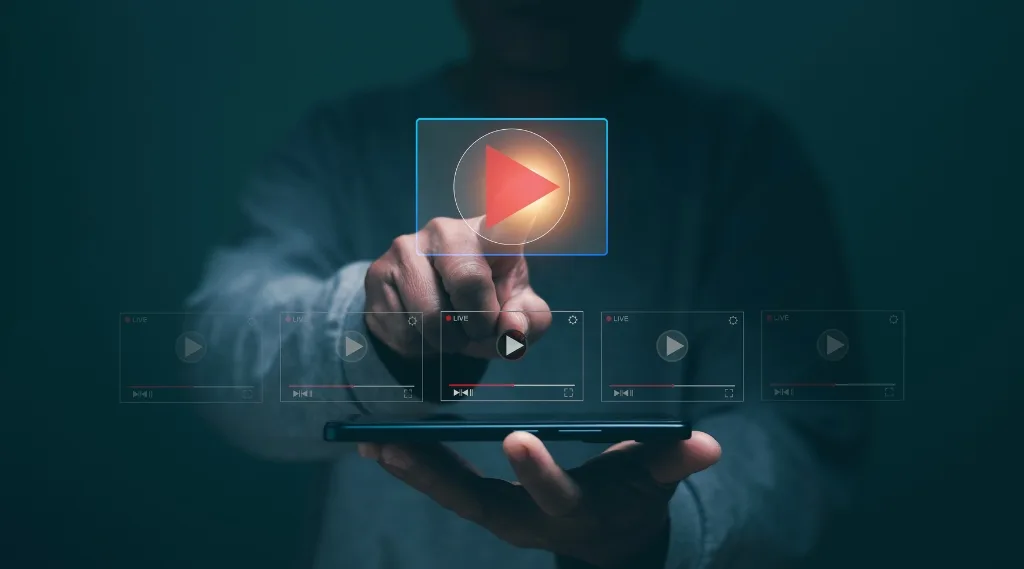 digital marketing trend video marketing, a person using a smartphone with a glowing play button and video interface icons hovering above it