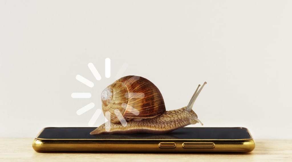 slow website why users leave websites, a snail crawling on top of a smartphone with a loading icon graphic above it
