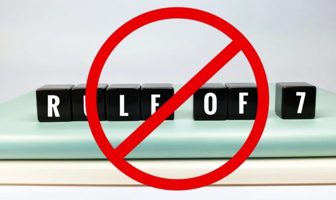 Marketing rule of 7: Black blocks spelling rule of 7 crossed out with red prohibition symbol representing outdated marketing theory